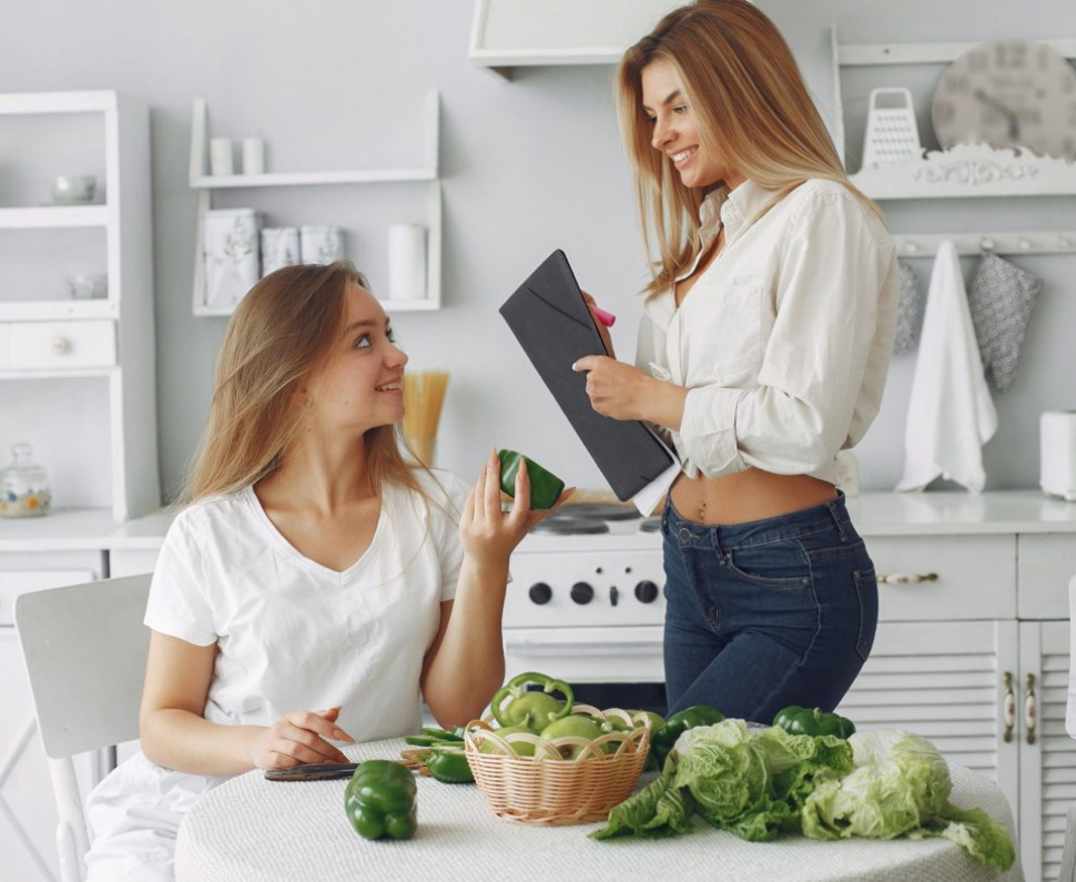 Healthy eating. Dieting and people concept. Blonde with a vegetable.