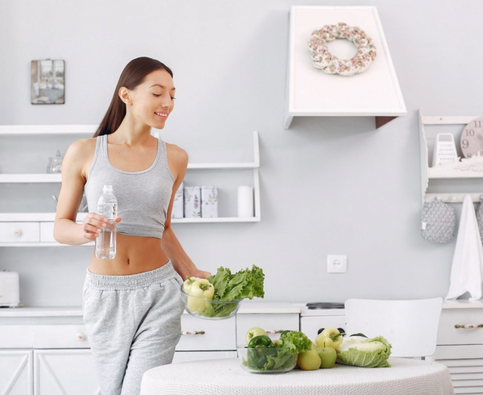 Healthy eating. Dieting and people concept. Brunette with a vegetable.